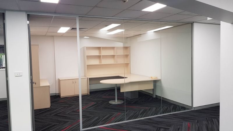 office fitout desks with shelves and glass walls lisarow guru labels